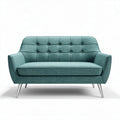 Mid-century modern teal loveseat with tufted upholstery and metal legs